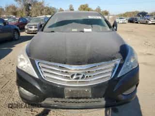 2012 Hyundai Azera z VIN KMHFH4JG9CA168073, wystawiony jako Copart lot #78685014 z przebiegiem 148 395 mil mil oraz Czysty tytuł • Clean title. Historia ofert i sprzedaży dostępna na DreamBid. Obrazek 5.