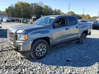 ✅ 2022 GMC Canyon 4WD AT4 • VIN: 1GTG6FEN3N1118033 • Лот: 86547405. Опубликован ранее на Copart с пробегом 31 204 миль. Бесплатный доступ к архиву аукционных продаж из США и подробный отчёт об истории автомобиля на DreamBid. Изображение 1.
