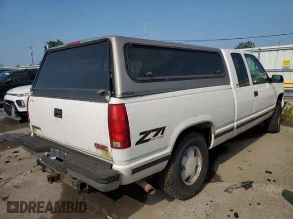 ✅ 1998 GMC Sierra 1500 • VIN: 1GTEK19R2WE545412 • Lot: 68174745. Listed on Copart with 129,159 mi. Free auction sales archive from the USA and detailed vehicle history report at DreamBid. Image 3.