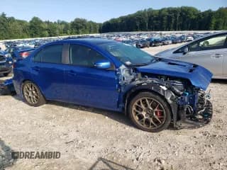 ✅ 2015 Mitsubishi Lancer Evolution Final Edition • VIN: JA32W7FV7FU608214 • Lot: 68316174. Wystawiony na Copart z przebiegiem 56 714 mil. Bezpłatny archiwum sprzedaży aukcyjnych z USA i szczegółowy raport historii pojazdu na DreamBid. Zdjęcie 4.