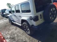 ✅ 2018 Jeep Wrangler Unlimited Sahara • VIN: 1C4HJXEG0JW321355 • Lot: 42343112. Listed on IAAI with 102,457 mi. Free auction sales archive from the USA and detailed vehicle history report at DreamBid. Image 3.