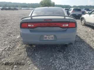 2013 Dodge Charger SRT-8 z VIN 2C3CDXEJ9DH521185, wystawiony jako Copart lot #65207205 z przebiegiem 69 215 mil mil oraz Szkoda całkowita • Salvage title. Historia ofert i sprzedaży dostępna na DreamBid. Obrazek 6.