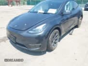 ✅ 2025 Tesla Model Y Long Range • VIN: 7SAYGDEE1SF303533 • Lot: 42584561. Listed on IAAI with 20,983 mi. Free auction sales archive from the USA and detailed vehicle history report at DreamBid. Image 6.