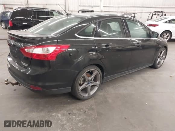 ✅ 2014 Ford Focus Titanium • VIN: 1FADP3J29EL315924 • Lot: 43728139. Listed on IAAI with 78,540 mi. Free auction sales archive from the USA and detailed vehicle history report at DreamBid. Image 4.