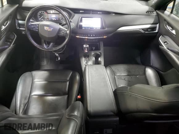 ✅ 2019 Cadillac XT4 AWD Premium Luxury • VIN: 1GYFZDR49KF229705 • Lot: 92904835. Listed on Copart with 52,260 mi. Free auction sales archive from the USA and detailed vehicle history report at DreamBid. Image 8.