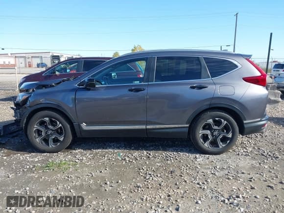 ✅ 2018 Honda CR-V Touring • VIN: 7FARW2H91JE038560 • Лот: 43492936. Опубликован ранее на IAAI с пробегом 94 898 миль. Бесплатный доступ к архиву аукционных продаж из США и подробный отчёт об истории автомобиля на DreamBid. Изображение 14.