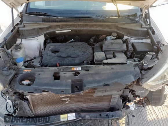 ✅ 2017 Hyundai Santa Fe 2.4L • VIN: 5XYZUDLB0HG400694 • Lot: 86504635. Listed on Copart with 174,876 mi. Free auction sales archive from the USA and detailed vehicle history report at DreamBid. Image 12.