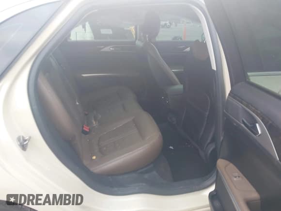 ✅ 2016 Lincoln MKZ • VIN: 3LN6L2G90GR620581 • Лот: 43399283. Опубликован ранее на IAAI с пробегом 93 271 миль. Бесплатный доступ к архиву аукционных продаж из США и подробный отчёт об истории автомобиля на DreamBid. Изображение 8.