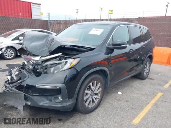 ✅ 2019 Honda Pilot EX-L • VIN: 5FNYF5H55KB037497 • Lot: 43255693. Listed on IAAI with 61,314 mi. Free auction sales archive from the USA and detailed vehicle history report at DreamBid. Image 2.