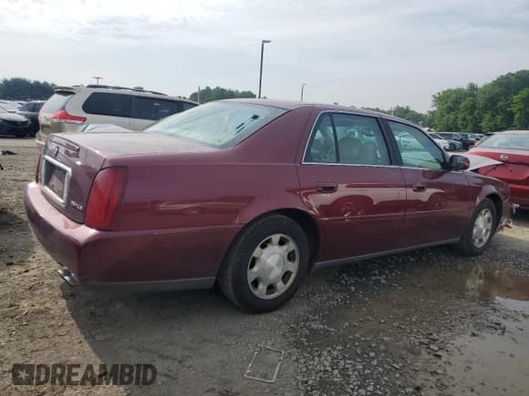 ✅ 2001 Cadillac DeVille • VIN: 1G6KD54Y51U268534 • Lot: 60542015. Listed on Copart with 100,712 mi. Free auction sales archive from the USA and detailed vehicle history report at DreamBid. Image 3.
