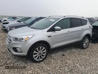 ✅ 2017 Ford Escape Titanium • VIN: 1FMCU0JD1HUD26747 • Lot: 91191585. Wystawiony na Copart z przebiegiem 121 878 mil. Bezpłatny archiwum sprzedaży aukcyjnych z USA i szczegółowy raport historii pojazdu na DreamBid. Zdjęcie 1.