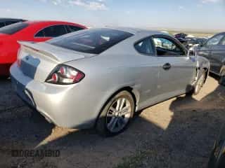 2008 Hyundai Tiburon GS с VIN KMHHM66D48U293082, выставлен на аукционе Copart как лот 64401385 с пробегом 71 163 миль миль и Списание • Salvage title. История ставок и продаж доступна на DreamBid. Изображение 3.