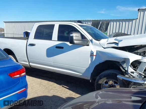 ✅ 2023 Ram 2500 Tradesman • VIN: 3C6UR5CL5PG502252 • Lot: 41066163. Listed on IAAI with 36,271 mi. Free auction sales archive from the USA and detailed vehicle history report at DreamBid. Image 1.