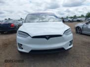 ✅ 2020 Tesla Model X Performance • VIN: 5YJXCBE40LF240037 • Lot: 42762526. Listed on IAAI with 89,932 mi. Free auction sales archive from the USA and detailed vehicle history report at DreamBid. Image 12.