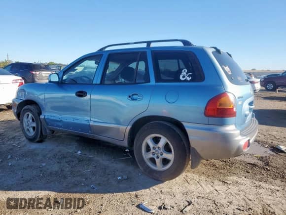 2004 Hyundai Santa Fe with VIN KM8SB12B64U826594, listed as a Copart auction lot 90612545 with 101,208 mi miles and Salvage title. Bid and sale history available at DreamBid. Image 2.