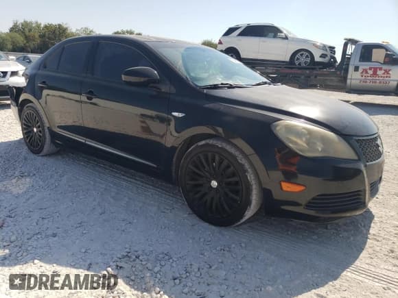 ✅ 2011 Suzuki Kizashi SE • VIN: JS2RE9A34B6111601 • Lot: 75945784. Listed on Copart with 128,926 mi. Free auction sales archive from the USA and detailed vehicle history report at DreamBid. Image 4.