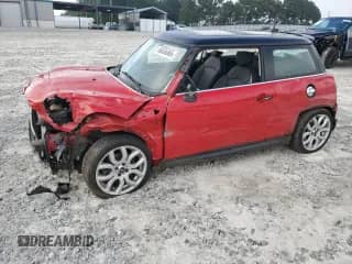 2010 MINI Hardtop S with VIN WMWMF7C55ATZ70438, listed as a Copart auction lot 66036565 with 40,438 mi miles and Salvage title. Bid and sale history available at DreamBid. Image 1.
