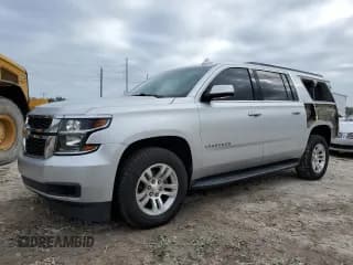 ✅ 2018 Chevrolet Suburban LT • VIN: 1GNSCHKC3JR270995 • Lot: 73978154. Listed on Copart with 151,982 mi. Free auction sales archive from the USA and detailed vehicle history report at DreamBid. Image 1.
