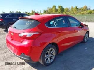 2019 Chevrolet Cruze LT with VIN 3G1BE6SMXKS553496, listed as a IAAI auction lot 43338426 with 136,150 mi miles and . Bid and sale history available at DreamBid. Image 4.