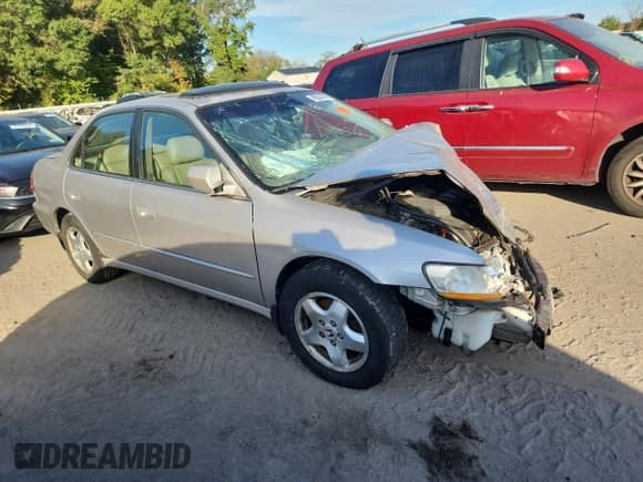 1999 Honda Accord EX with VIN 1HGCG1650XA047648, listed as a Copart auction lot 85530585 with Not provided miles and Salvage title. Bid and sale history available at DreamBid. Image 4.