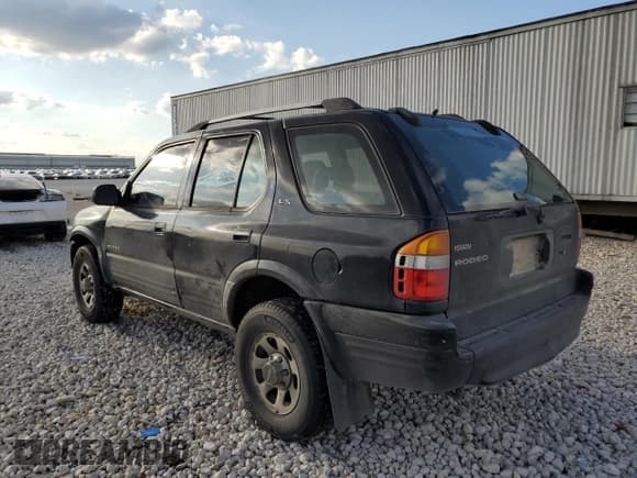✅ 1999 Isuzu Rodeo S • VIN: 4S2CK58W3X4362974 • Lot: 43155155. Listed on Copart with 396,448 mi. Free auction sales archive from the USA and detailed vehicle history report at DreamBid. Image 2.