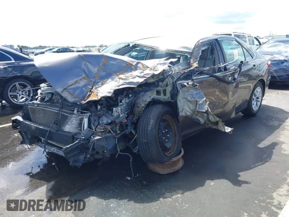 2015 Toyota Camry LE with VIN 4T4BF1FK4FR446399, listed as a IAAI auction lot 43128423 with 82,545 mi miles and . Bid and sale history available at DreamBid. Image 18.