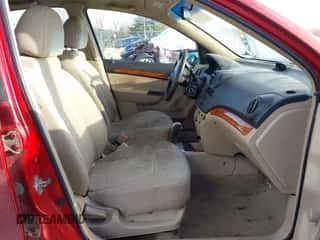 2011 Chevrolet Aveo 1LT z VIN KL1TD5DE5BB134392, wystawiony jako IAAI lot #41352555 z przebiegiem 153 160 mil mil oraz . Historia ofert i sprzedaży dostępna na DreamBid. Obrazek 5.