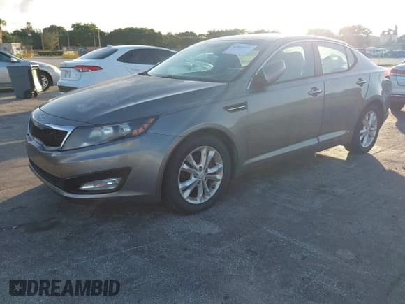 ✅ 2012 Kia Optima EX • VIN: 5XXGN4A7XCG010038 • Lot: 43835794. Listed on IAAI with 54,734 mi. Free auction sales archive from the USA and detailed vehicle history report at DreamBid. Image 2.