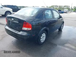 ✅ 2005 Chevrolet Aveo LS • VIN: KL1TD52685B481277 • Lot: 42165358. Wystawiony na IAAI z przebiegiem 247 940 mil. Bezpłatny archiwum sprzedaży aukcyjnych z USA i szczegółowy raport historii pojazdu na DreamBid. Zdjęcie 4.
