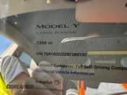 ✅ 2025 Tesla Model Y Long Range • VIN: 7SAYGDED2SF266130 • Lot: 80688045. Wystawiony na Copart z przebiegiem 7 556 mil. Bezpłatny archiwum sprzedaży aukcyjnych z USA i szczegółowy raport historii pojazdu na DreamBid. Zdjęcie 9.
