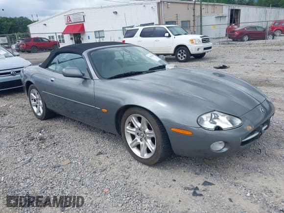✅ 2003 Jaguar XK • VIN: SAJDA42C932A32083 • Lot: 42632461. Listed on IAAI with 32,581 mi. Free auction sales archive from the USA and detailed vehicle history report at DreamBid. Image 1.