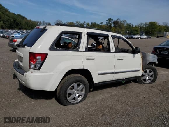 ✅ 2010 Jeep Grand Cherokee Laredo • VIN: 1J4PR4GK0AC119681 • Лот: 94629575. Опубликован ранее на Copart с пробегом Не указан. Бесплатный доступ к архиву аукционных продаж из США и подробный отчёт об истории автомобиля на DreamBid. Изображение 3.