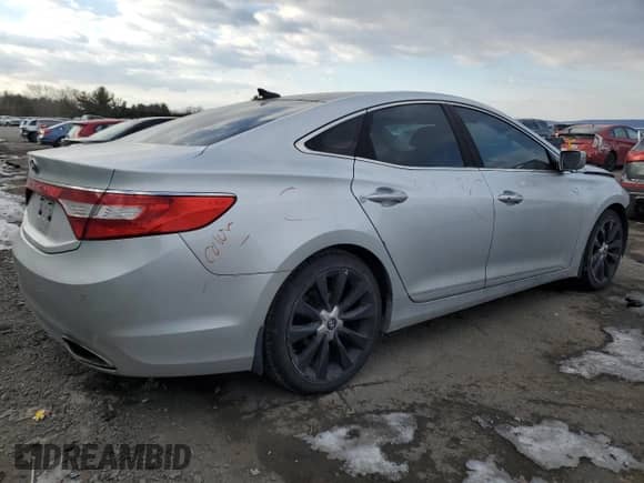 2013 Hyundai Azera z VIN KMHFH4JG5DA300781, wystawiony jako Copart lot #42493805 z przebiegiem 165 673 mil mil oraz Szkoda całkowita • Salvage title. Historia ofert i sprzedaży dostępna na DreamBid. Obrazek 3.