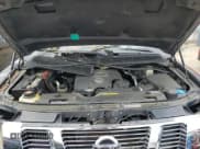 ✅ 2015 Nissan Titan SL • VIN: 1N6AA0ECXFN501278 • Lot: 64428195. Listed on Copart with 150,855 mi. Free auction sales archive from the USA and detailed vehicle history report at DreamBid. Image 11.