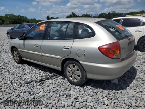 ✅ 2002 Kia Rio • VIN: KNADC163026060437 • Lot: 51721155. Listed on Copart with 98,735 mi. Free auction sales archive from the USA and detailed vehicle history report at DreamBid. Image 2.
