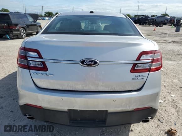 ✅ 2013 Ford Taurus SEL • VIN: 1FAHP2E87DG228993 • Лот: 92415415. Опубликован ранее на Copart с пробегом 35 662 миль. Бесплатный доступ к архиву аукционных продаж из США и подробный отчёт об истории автомобиля на DreamBid. Изображение 6.