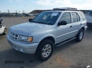 ✅ 2002 Isuzu Rodeo S • VIN: 4S2CK58W024342335 • Lot: 42595434. Wystawiony na IAAI z przebiegiem 144 529 mil. Bezpłatny archiwum sprzedaży aukcyjnych z USA i szczegółowy raport historii pojazdu na DreamBid. Zdjęcie 2.