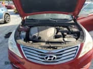 ✅ 2012 Hyundai Azera • VIN: KMHFG4JG5CA183172 • Лот: 90432795. Опубликован ранее на Copart с пробегом 82 676 миль. Бесплатный доступ к архиву аукционных продаж из США и подробный отчёт об истории автомобиля на DreamBid. Изображение 11.