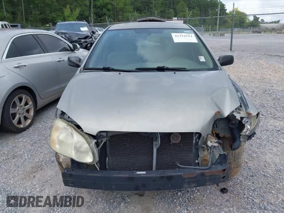 ✅ 2003 Toyota Corolla CE • VIN: JTDBR32E730047927 • Lot: 42324214. Listed on IAAI with 267,828 mi. Free auction sales archive from the USA and detailed vehicle history report at DreamBid. Image 6.