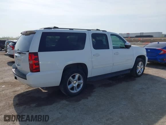 ✅ 2011 Chevrolet Suburban LT • VIN: 1GNSCJE02BR160367 • Lot: 42023236. Listed on IAAI with 158,689 mi. Free auction sales archive from the USA and detailed vehicle history report at DreamBid. Image 4.