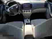 2009 Hyundai Elantra GLS z VIN KMHDU46D69U754559, wystawiony jako Copart lot #69687714 z przebiegiem 114 191 mil mil oraz Szkoda całkowita • Salvage title. Historia ofert i sprzedaży dostępna na DreamBid. Obrazek 8.