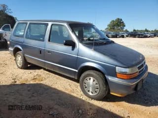✅ 1992 Dodge Caravan • VIN: 2B4GH2535NR705117 • Lot: 77091264. Listed on Copart with 174,008 mi. Free auction sales archive from the USA and detailed vehicle history report at DreamBid. Image 4.