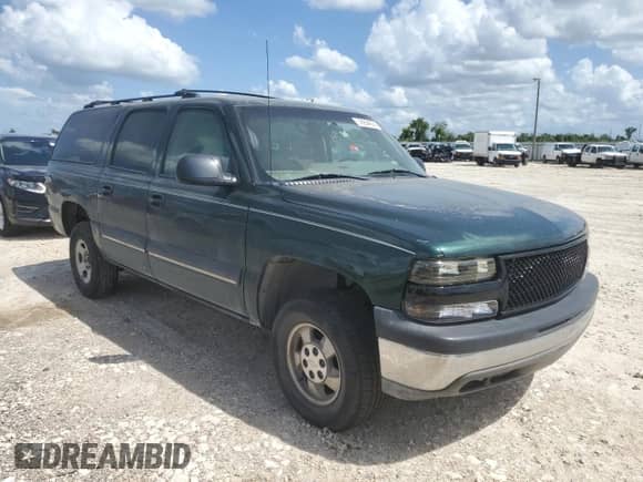 2001 Chevrolet Suburban LS z VIN 3GNEC16TX1G199311, wystawiony jako Copart lot #59264024 z przebiegiem 277 997 mil mil oraz Czysty tytuł • Clean title. Historia ofert i sprzedaży dostępna na DreamBid. Obrazek 4.