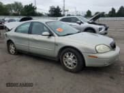 ✅ 2003 Mercury Sable LS Premium • VIN: 1MEHM55S13G634829 • Lot: 56970235. Listed on Copart with 110,918 mi. Free auction sales archive from the USA and detailed vehicle history report at DreamBid. Image 4.