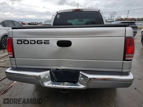 2002 Dodge Dakota SLT z VIN 1B7HL48X72S584617, wystawiony jako Copart lot #86504284 z przebiegiem 236 216 mil mil oraz Szkoda całkowita • Salvage title. Historia ofert i sprzedaży dostępna na DreamBid. Obrazek 6.
