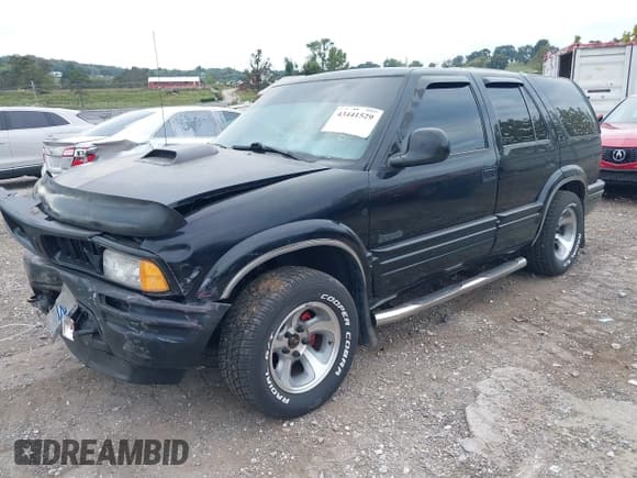 ✅ 1997 Oldsmobile Bravada • VIN: 1GHDT13WXV2725030 • Лот: 43441529. Опубликован ранее на IAAI с пробегом 348 116 миль. Бесплатный доступ к архиву аукционных продаж из США и подробный отчёт об истории автомобиля на DreamBid. Изображение 2.