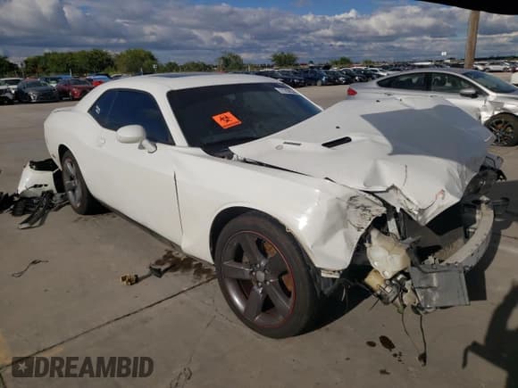 ✅ 2014 Dodge Challenger SXT • VIN: 2C3CDYAG1EH137399 • Lot: 71238334. Wystawiony na Copart z przebiegiem 165 497 mil. Bezpłatny archiwum sprzedaży aukcyjnych z USA i szczegółowy raport historii pojazdu na DreamBid. Zdjęcie 4.