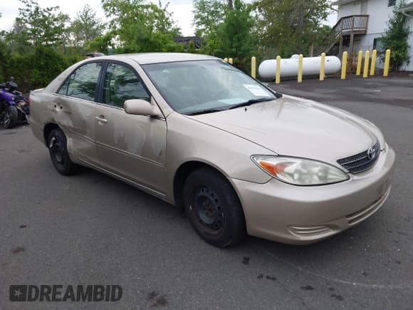 ✅ 2004 Toyota Camry LE • VIN: 4T1BE32K14U859389 • Lot: 41879442. Listed on IAAI with 177,929 mi. Free auction sales archive from the USA and detailed vehicle history report at DreamBid. Image 1.
