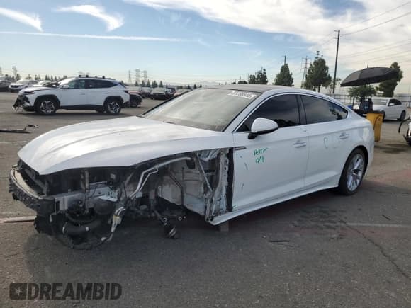 ✅ 2020 Audi A5 Sportback Premium • VIN: WAUANCF57LA005024 • Lot: 87266845. Listed on Copart with 69,104 mi. Free auction sales archive from the USA and detailed vehicle history report at DreamBid. Image 1.