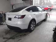 ✅ 2023 Tesla Model Y Long Range • VIN: 7SAYGAEEXPF789037 • Lot: 41551605. Listed on IAAI with 8,630 mi. Free auction sales archive from the USA and detailed vehicle history report at DreamBid. Image 4.